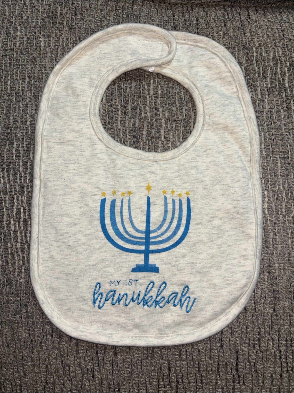 Mud Pie Light Gray Bib with Blue Menorah and Gold Stars
